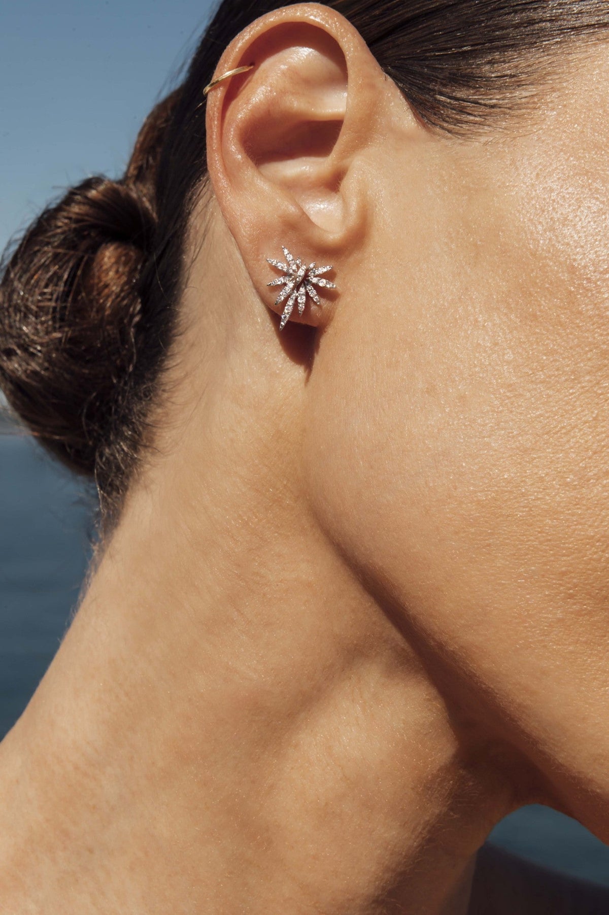 Phoenix diamond earrings by Marina Fragoso