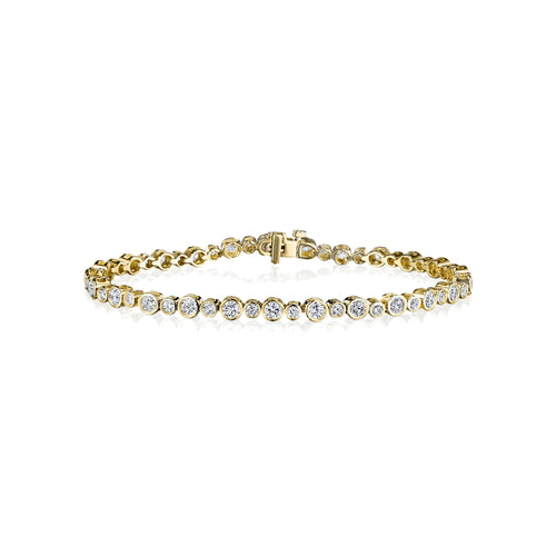 Diamond bezel tennis bracelet in 18k yellow gold
