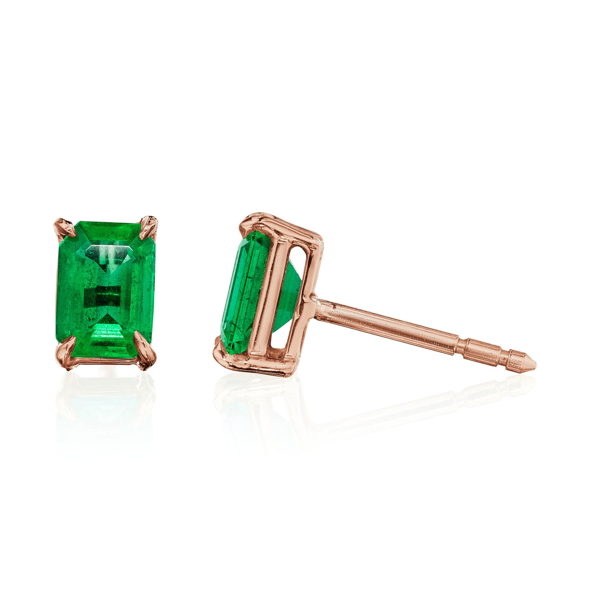 Emerald cut Colombian emerald stud earrings, 2 carats total, in 18k rose gold, side view