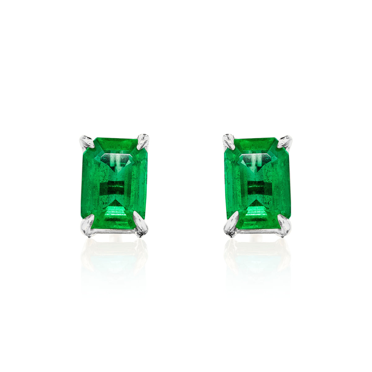 Emerald cut Colombian emerald stud earrings, 2 carats total, in 18k white gold