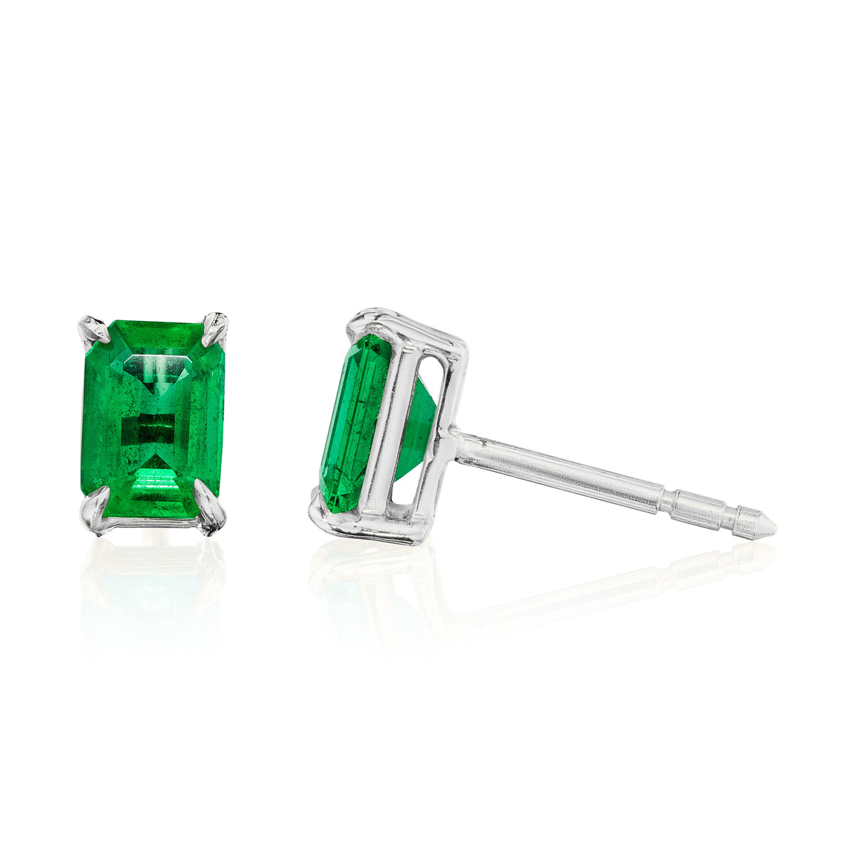 Emerald cut Colombian emerald stud earrings, 2 carats total, in 18k white gold, side view