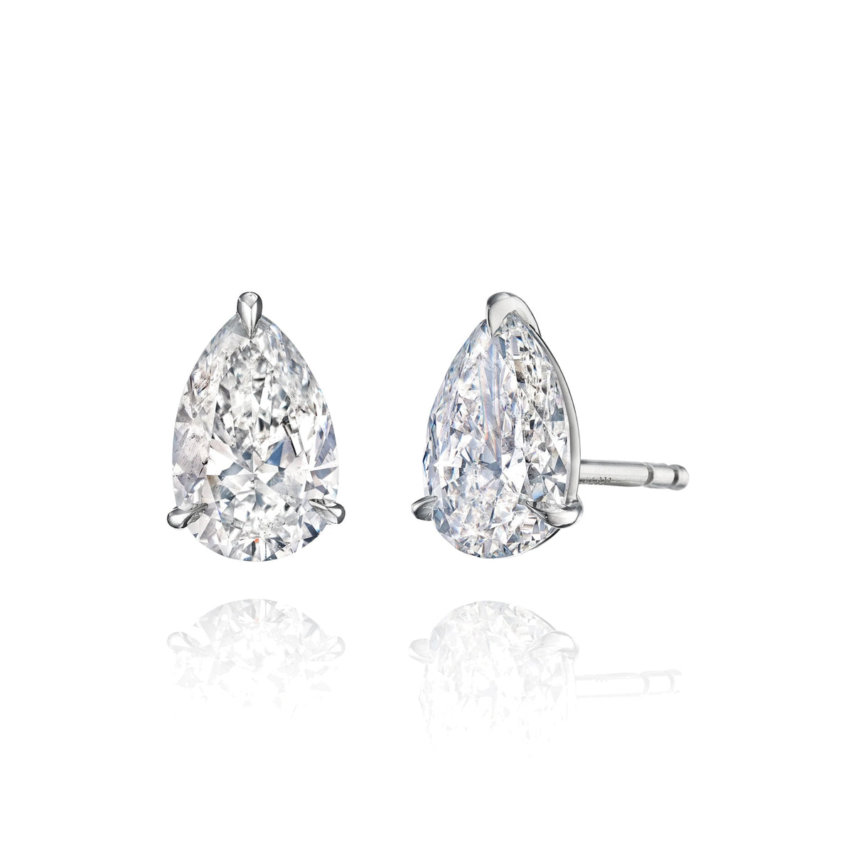 Pear shape diamond stud earrings in 18k gold, side view