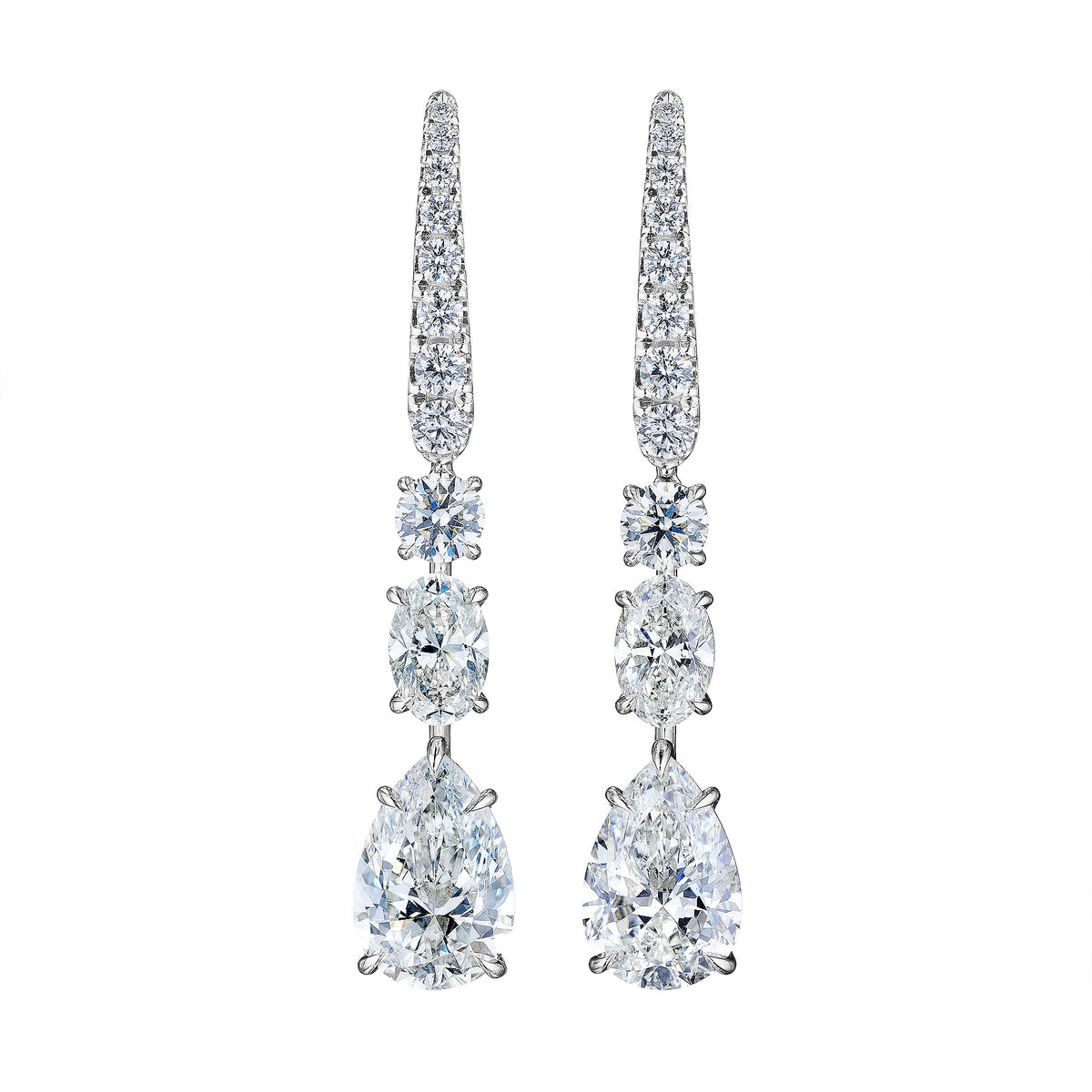 Pear diamond drop earrings in platinum, front view
