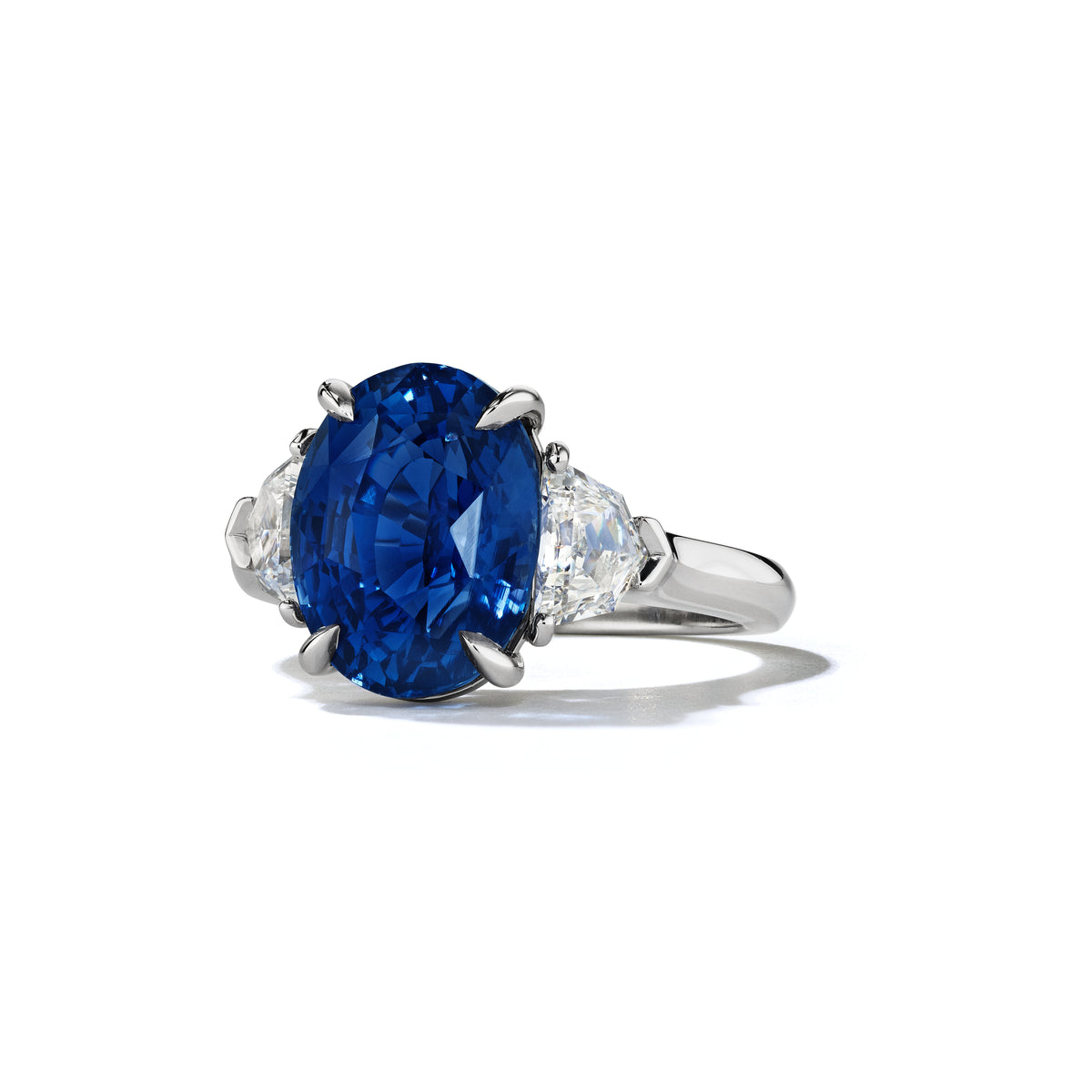 Custom oval sapphire and diamond ring in platinum, side view