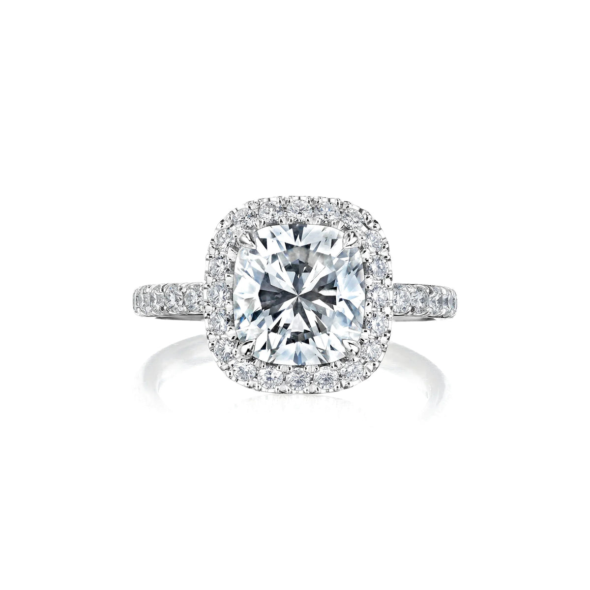 Custom cushion cut diamond engagement ring with pavé halo in 18k gold