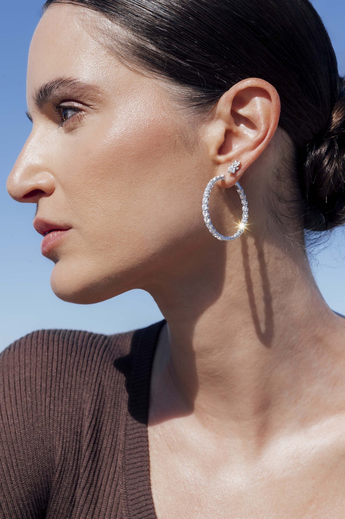 Left: earrings, Inside-Out Diamond Hoops. Right: earrings, Inside-Out Diamond Hoops and Aster Diamond Studs