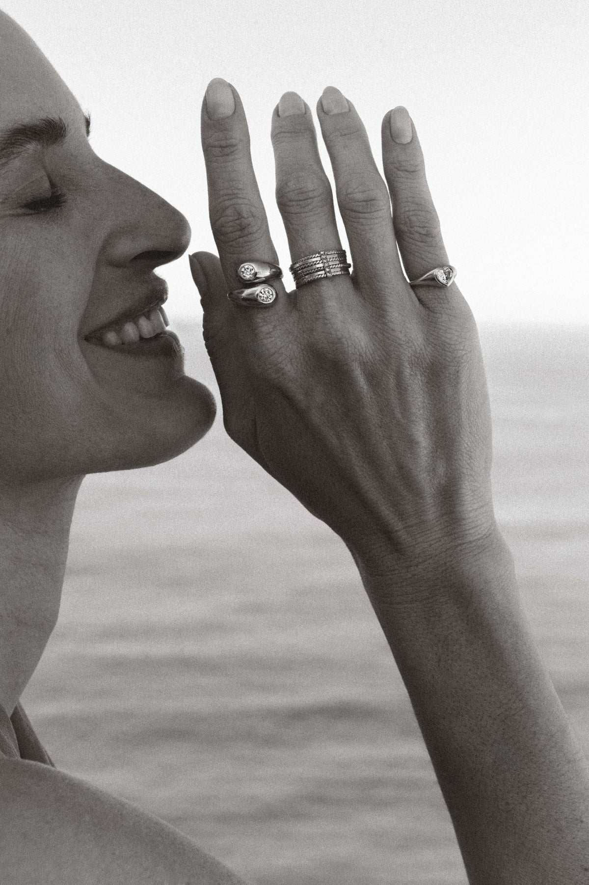Heart shape diamond ring in 18k yellow gold, worn on the hand