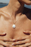 Our Lady of Nazareth Enamel Medallion Necklace worn in the Marina Fragoso Rio campaign