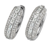 A pair of silver hoop earrings paved with small clear stones and featuring a central row of larger baguette-cut clear stones, shown on a white background.
