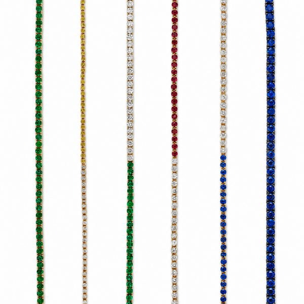 Five custom tennis-style chains in different colors: green, yellow gold, clear stones on a gold base, deep red, and blue, shown against a plain white background.