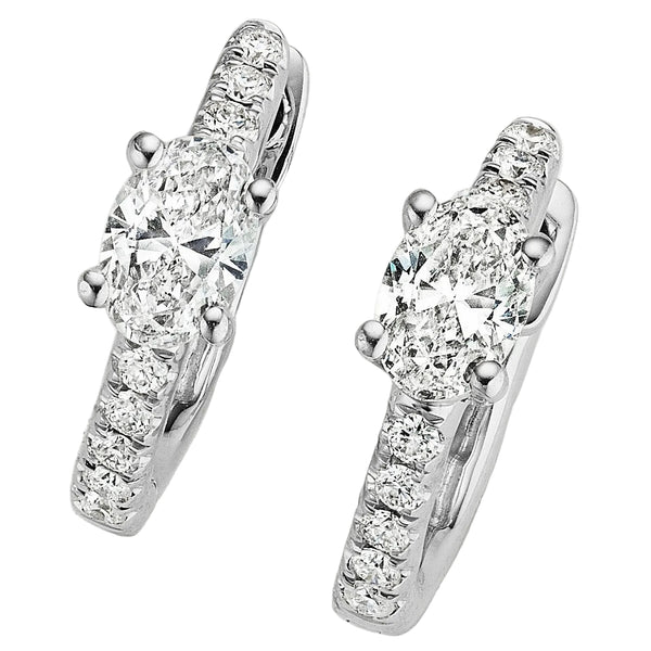 Oval Diamond and Pavé Huggies by Marina Fragoso