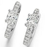 Oval Diamond and Pavé Huggies by Marina Fragoso